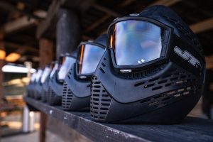 Paintball masks lined in a row
